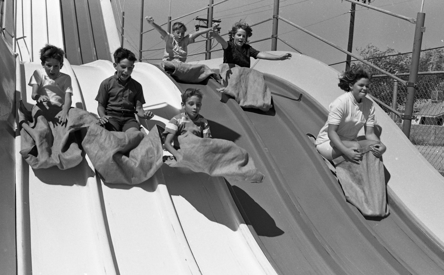 Finally sliding down the Magic Carpet slides